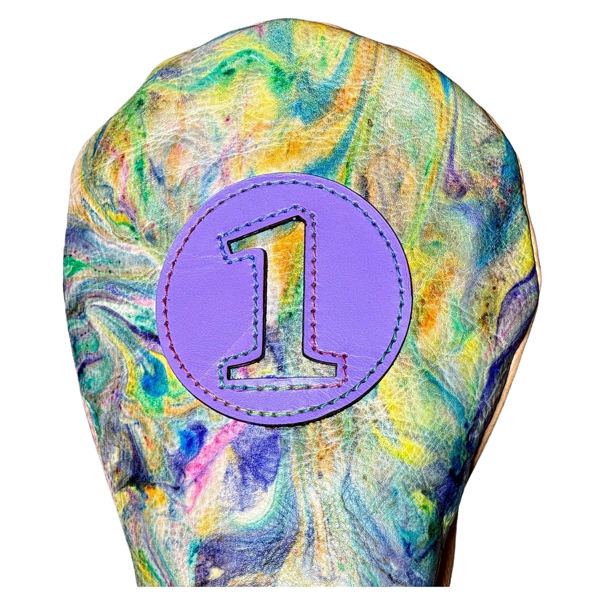 Close up of top of custom Tie-dyed leather headcover with blues and purples with purple leather circle cut out with number one