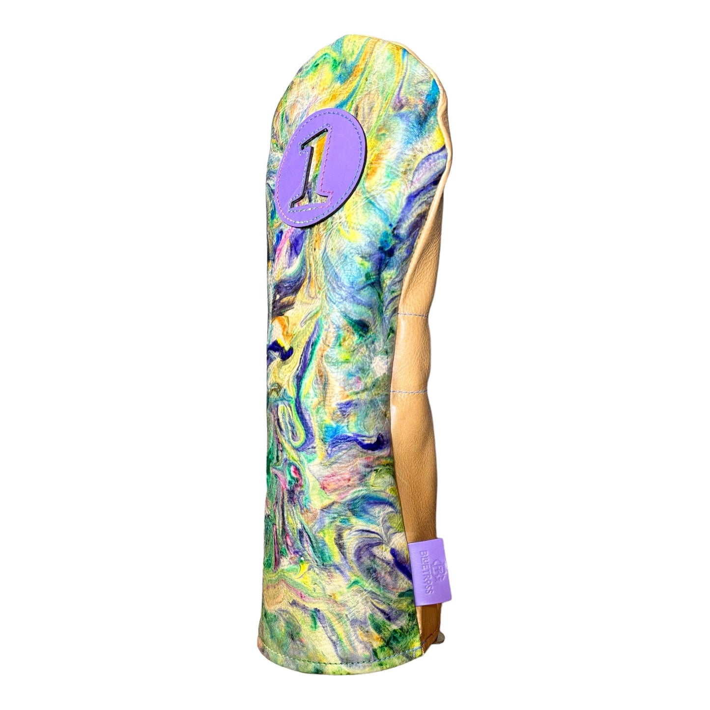 ustom Tie-dyed leather headcover with blues and purples with purple leather circle cut out with number one side view showing natural color back