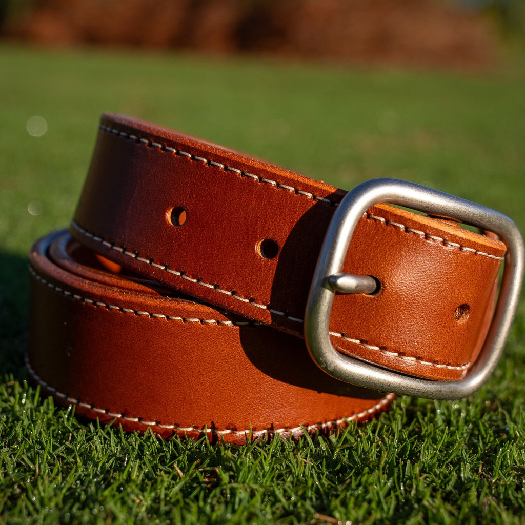 Fairway Signature Belt in premium Italian leather, vibrant  color congac with handcrafted stitching and a classic buckle.