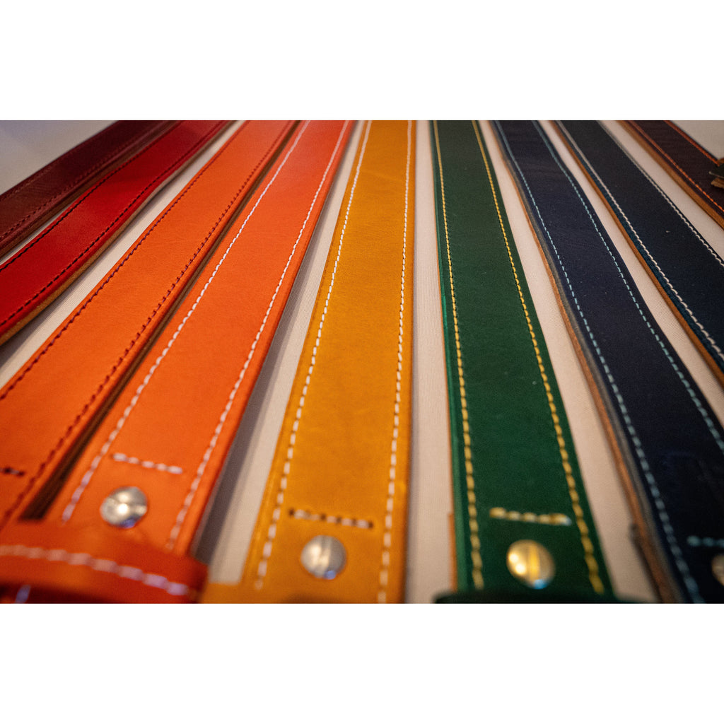 Fairway Signature Belt in premium Italian leather, showcasing a variety of vibrant colors with handcrafted stitching and polished finishes.